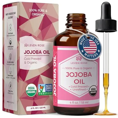 Leven Rose organic jojoba oil in amber glass bottle with dropper