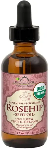US Organic Rosehip Seed Oil in an amber glass bottle with dropper