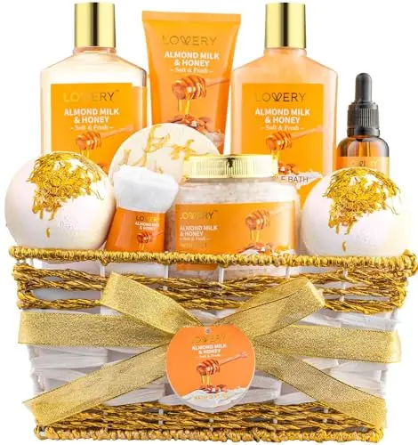 Lovery almond milk and honey spa gift basket with bath bombs, shower gel, scrub, and salts in a handmade basket.
