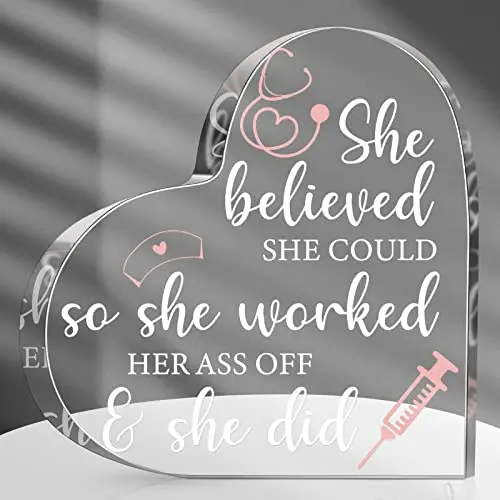 Pink heart-shaped acrylic plaque with inspirational nurse quote and medical icons