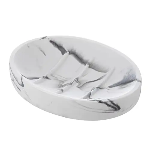 Oval soap dish with a white marble-effect finish and three raised internal ridges.