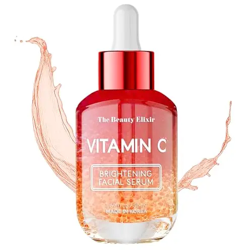 The Beauty Elixir Vitamin C Serum in elegant glass bottle with dropper