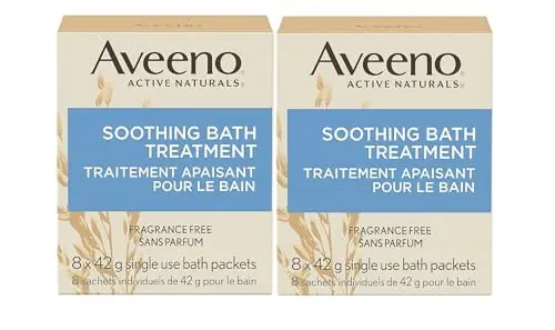 Aveeno Fragrance-Free Soothing Bath Treatment packets on a bathroom counter