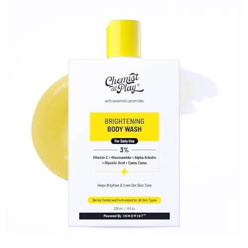 Chemist at Play Brightening Body Wash bottle with orange and white design