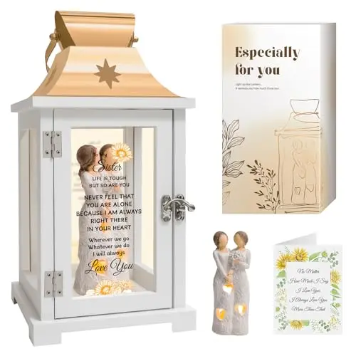 Decorative lantern with sister figurines and a flickering LED candle inside