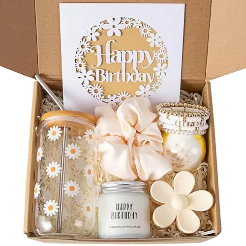 MINICAULISPRINT gift box with a daisy-print glass cup with bamboo lid, candle, bath bomb, hair clip, and bracelets.
