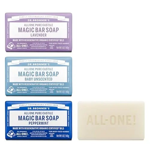 Dr. Bronner's Pure-Castile Magic Bar Soap Variety Pack of three bars on a wooden background