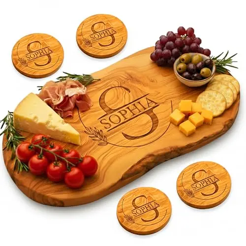 Personalized round olive wood cutting board with engraved message, displayed as a gift.