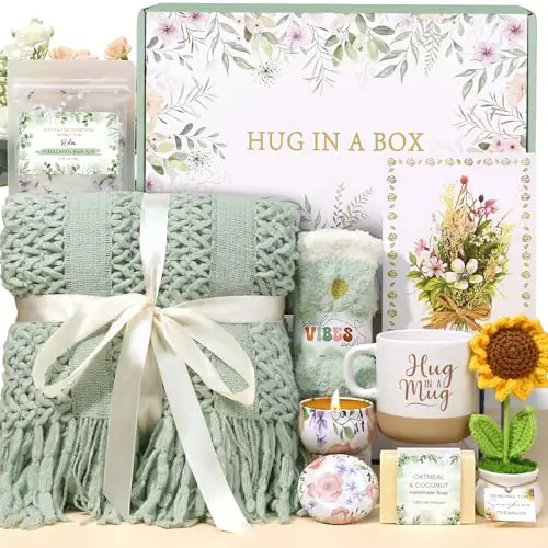 BaiCai sage green gift basket with a sunflower, knitted blanket, mug, and spa items in a floral theme.
