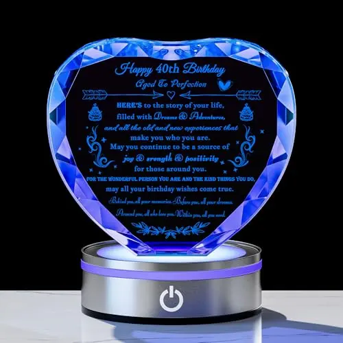 Clear K9 crystal heart ornament with laser-engraved design on a colorful LED light base