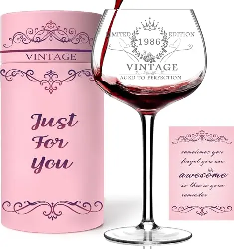 Clear hand-blown wine glass with platinum 'Vintage 1986' text in a gift box