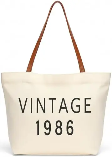 White canvas tote bag with bold 'VINTAGE 1986' black text print