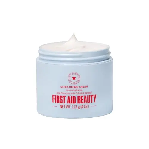 First Aid Beauty Ultra Repair Cream jar, a whipped face and body moisturizer.