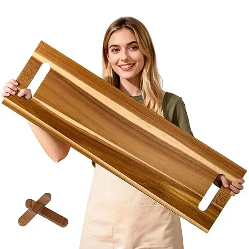 LDQ 36-inch extra large acacia wood charcuterie board with wooden risers on a dining table.